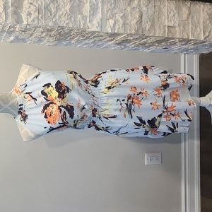 Dex Halter Floral dress with open back & ruffle bottom